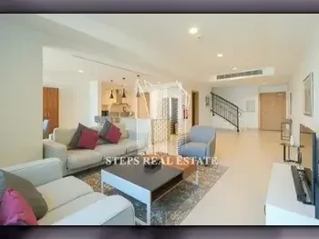 2 Bedrooms  Apartment  For Rent  in Doha -  The Pearl  Fully Furnished