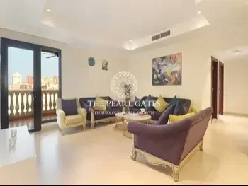 2 Bedrooms  Apartment  For Rent  in Doha -  The Pearl  Fully Furnished