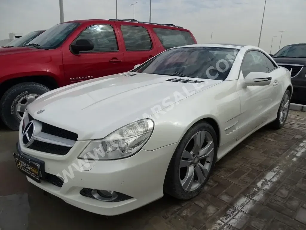 Mercedes-Benz  SL  280  2009  Automatic  12,000 Km  8 Cylinder  Rear Wheel Drive (RWD)  Coupe / Sport  White  With Warranty