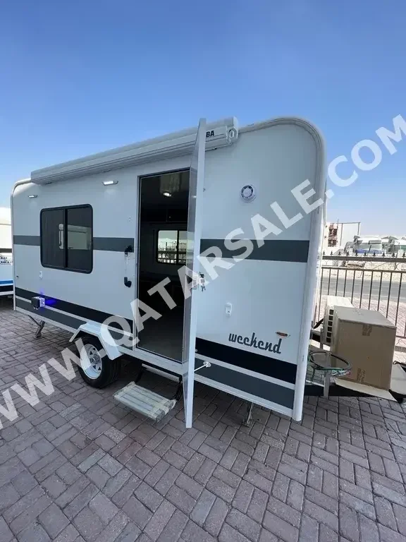 Caravan - 2023  - White  -Made in Qatar  - 0 Km