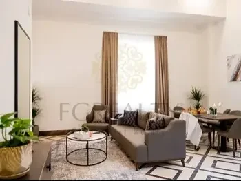 2 Bedrooms  Apartment  For Rent  in Doha -  Al Mansoura  Fully Furnished