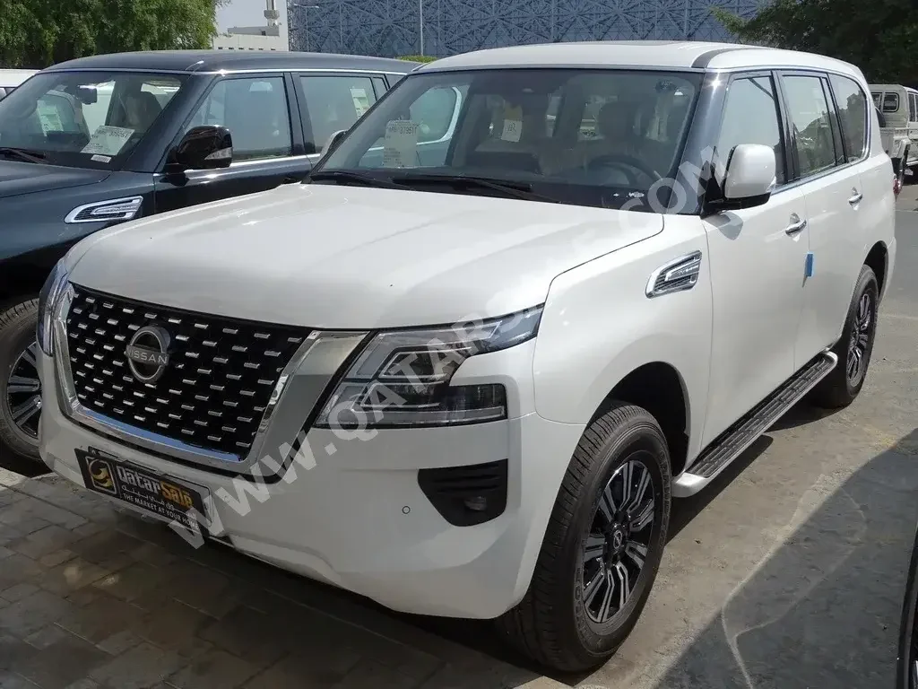 Nissan  Patrol  SE  2022  Automatic  0 Km  8 Cylinder  Four Wheel Drive (4WD)  SUV  White  With Warranty