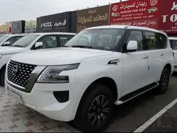  Nissan  Patrol  SE  2023  Automatic  0 Km  6 Cylinder  Four Wheel Drive (4WD)  SUV  White  With Warranty