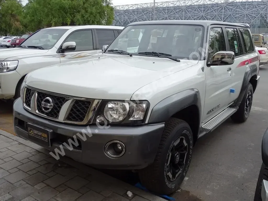 Nissan  Patrol  Super Safari  2022  Automatic  0 Km  6 Cylinder  Four Wheel Drive (4WD)  SUV  White  With Warranty