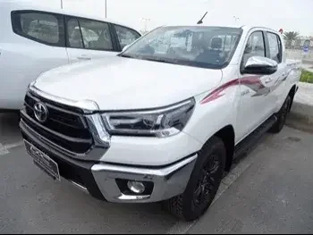 Toyota  Hilux  2023  Automatic  0 Km  4 Cylinder  Four Wheel Drive (4WD)  Pick Up  White  With Warranty