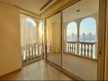 2 Bedrooms  Apartment  For Rent  in Doha -  The Pearl  Not Furnished