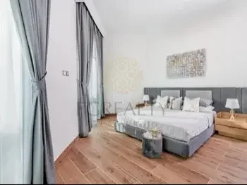 2 Bedrooms  Apartment  For Rent  in Doha -  The Pearl  Fully Furnished