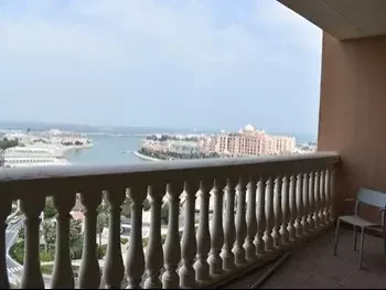 3 Bedrooms  Apartment  For Rent  in Doha -  The Pearl  Semi Furnished