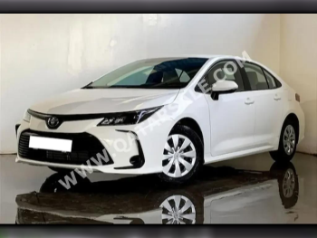 Toyota  Corolla  4 Cylinder  Sedan  White  2023