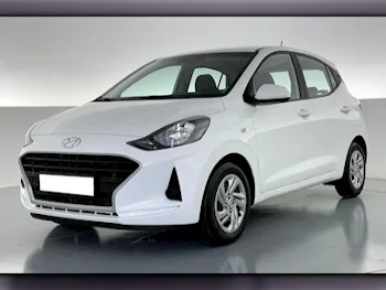 Hyundai  I 10  4 Cylinder  Hatchback  White  2023