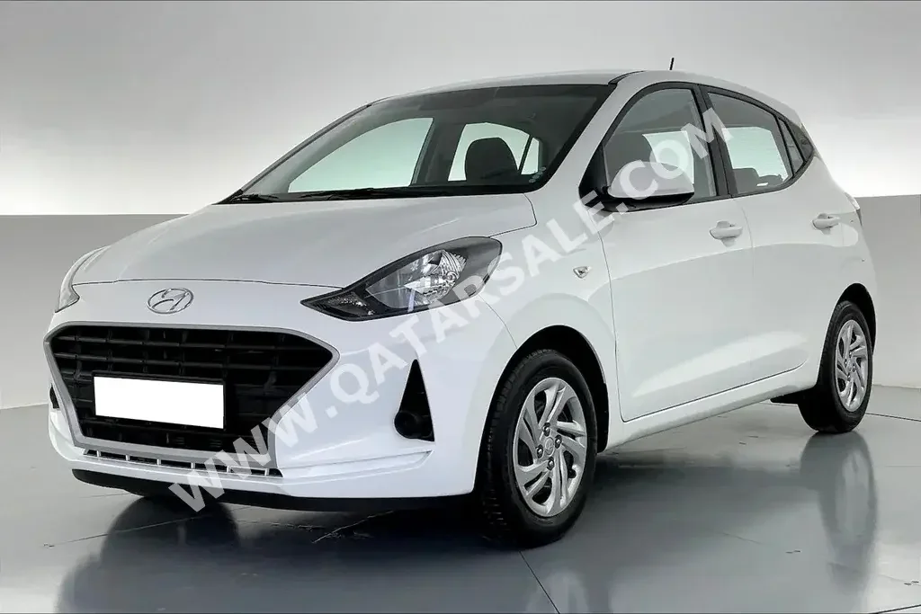 Hyundai  I 10  4 Cylinder  Hatchback  White  2023