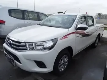 Toyota  Hilux  2023  Automatic  0 Km  4 Cylinder  Four Wheel Drive (4WD)  Pick Up  White  With Warranty