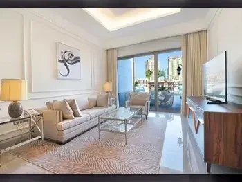 3 Bedrooms  Apartment  For Rent  in Doha -  The Pearl  Fully Furnished