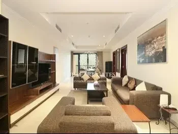 2 Bedrooms  Apartment  For Rent  in Doha -  The Pearl  Fully Furnished