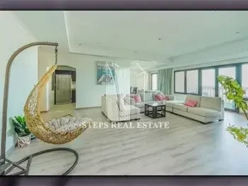 3 Bedrooms  Apartment  For Rent  in Doha -  The Pearl  Fully Furnished