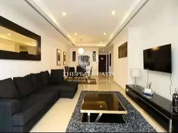 2 Bedrooms  Apartment  For Rent  in Doha -  The Pearl  Fully Furnished