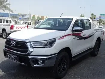 Toyota  Hilux  2023  Automatic  0 Km  4 Cylinder  Four Wheel Drive (4WD)  Pick Up  White  With Warranty