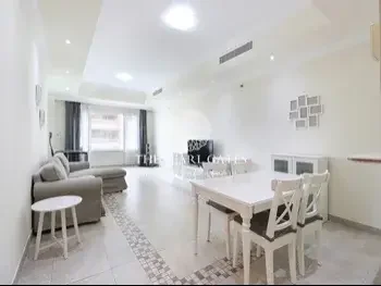 2 Bedrooms  Apartment  For Rent  in Doha -  The Pearl  Fully Furnished