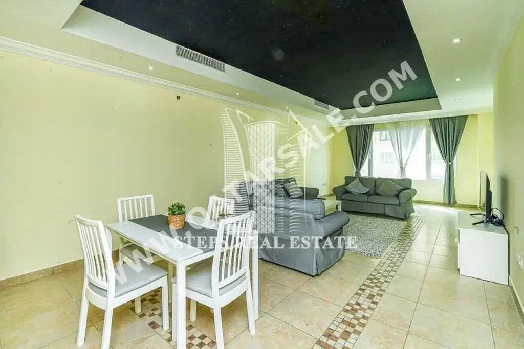 2 Bedrooms  Apartment  For Rent  in Doha -  The Pearl  Fully Furnished