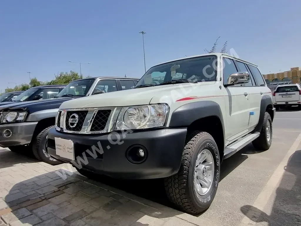 Nissan  Patrol  2022  Manual  0 Km  6 Cylinder  Four Wheel Drive (4WD)  SUV  White  With Warranty