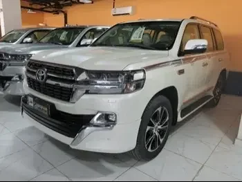 Toyota  Land Cruiser  GXR- Grand Touring  2021  Automatic  0 Km  6 Cylinder  Four Wheel Drive (4WD)  SUV  White  With Warranty