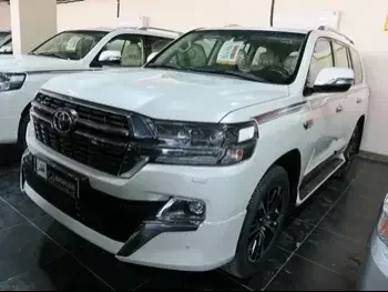 Toyota  Land Cruiser  GXR- Grand Touring  2021  Automatic  0 Km  6 Cylinder  Four Wheel Drive (4WD)  SUV  White  With Warranty