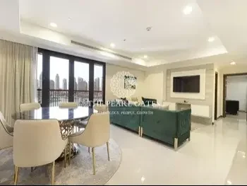 2 Bedrooms  Apartment  For Rent  in Doha -  The Pearl  Fully Furnished