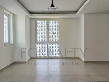 2 Bedrooms  Apartment  For Rent  in Doha -  The Pearl  Not Furnished