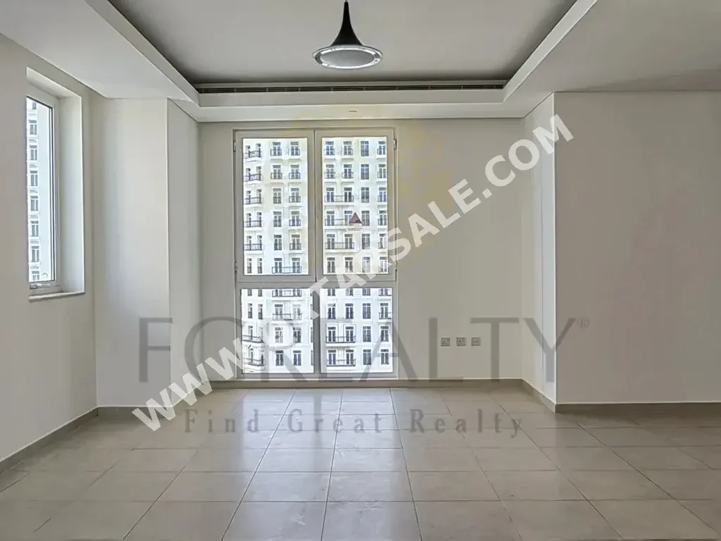 2 Bedrooms  Apartment  For Rent  in Doha -  The Pearl  Not Furnished