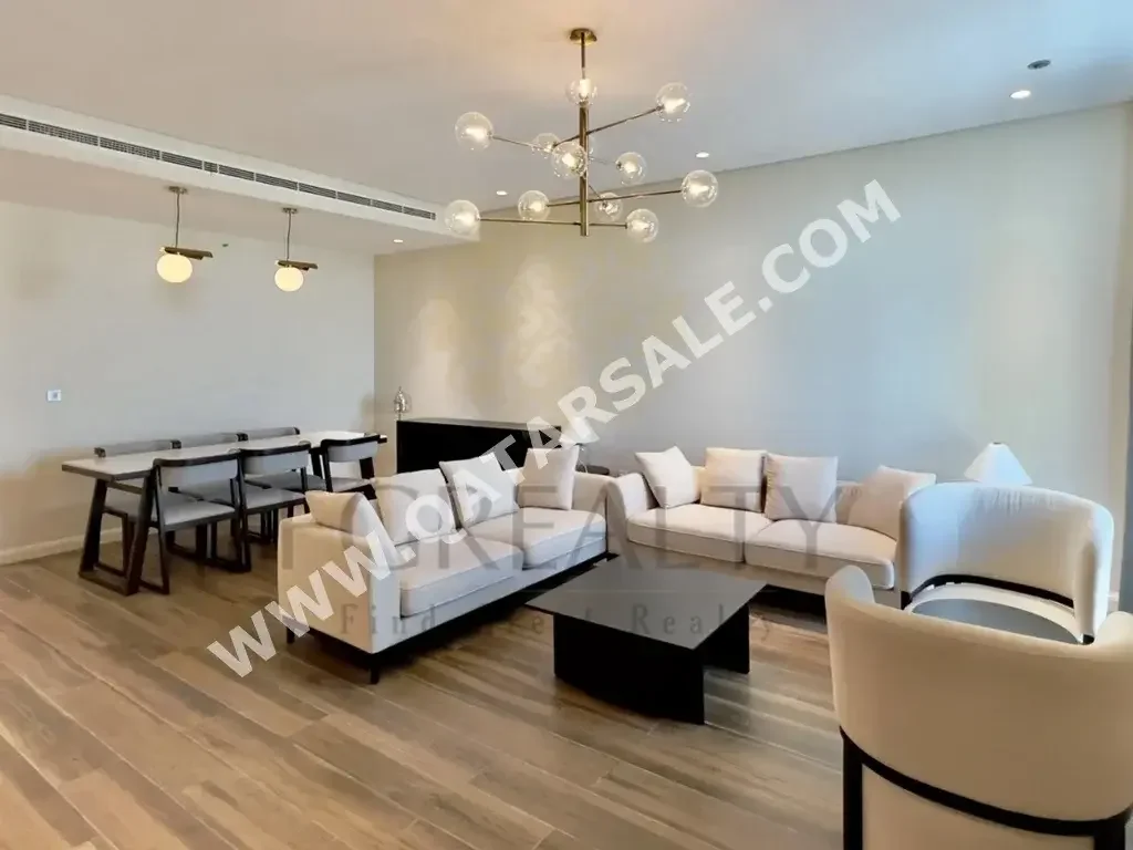 3 Bedrooms  Apartment  For Rent  in Doha -  The Pearl  Fully Furnished