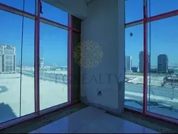 Labour Camp 2 Bedrooms  Apartment  For Sale  in Lusail -  Al Kharayej  Not Furnished