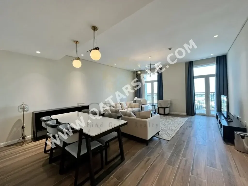 3 Bedrooms  Apartment  For Rent  in Doha -  The Pearl  Fully Furnished