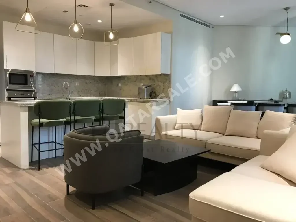 2 Bedrooms  Apartment  For Rent  in Doha -  The Pearl  Fully Furnished