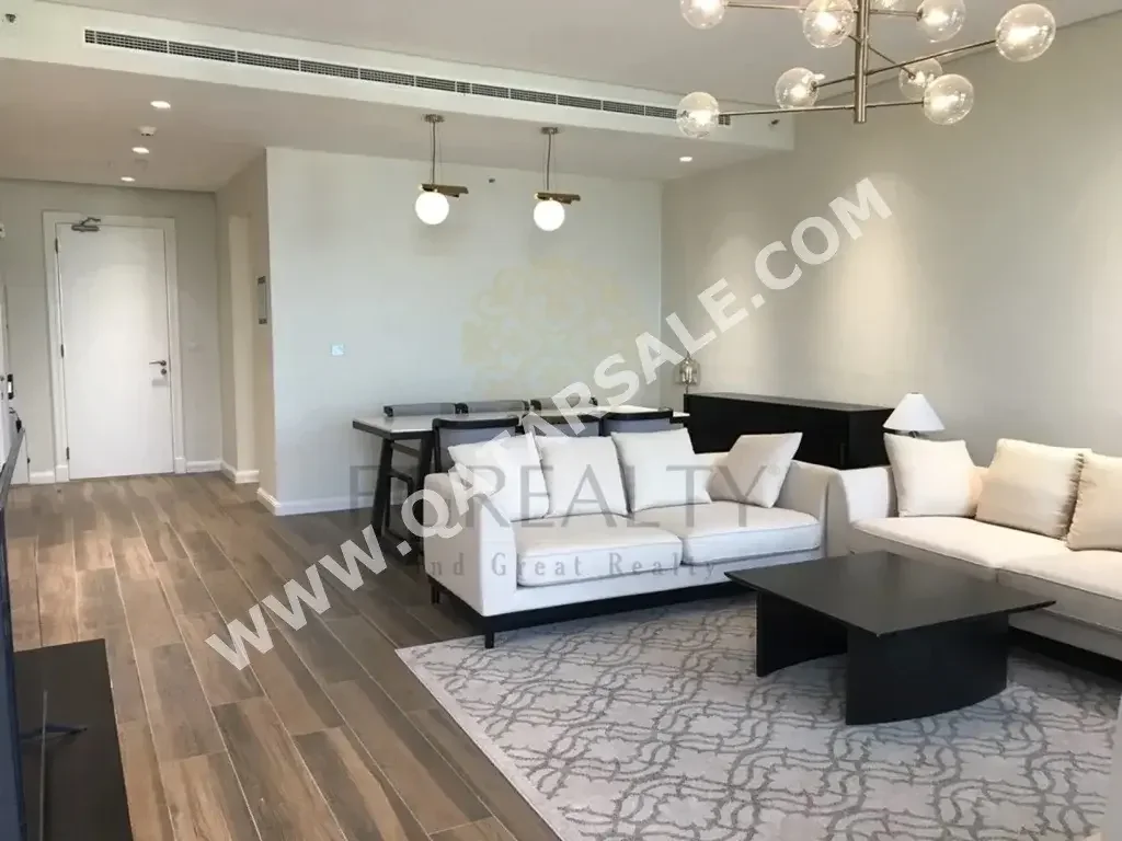 3 Bedrooms  Apartment  For Rent  in Doha -  The Pearl  Fully Furnished