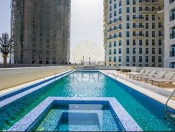 2 Bedrooms  Apartment  For Rent  in Doha -  The Pearl  Fully Furnished