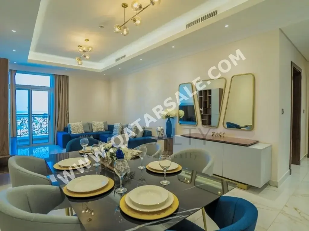 2 Bedrooms  Apartment  For Rent  in Doha -  The Pearl  Fully Furnished